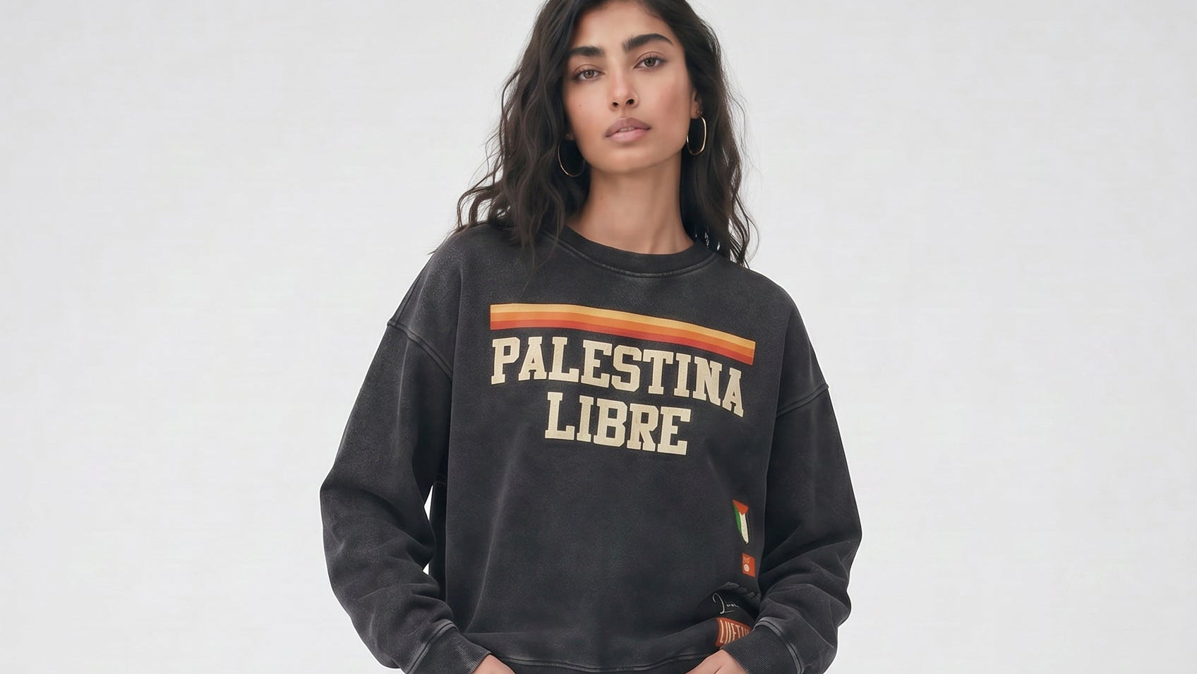 Persia wearing the Vintage Palestina Libre Washed Oversized Sweatshirt - hands in pockets